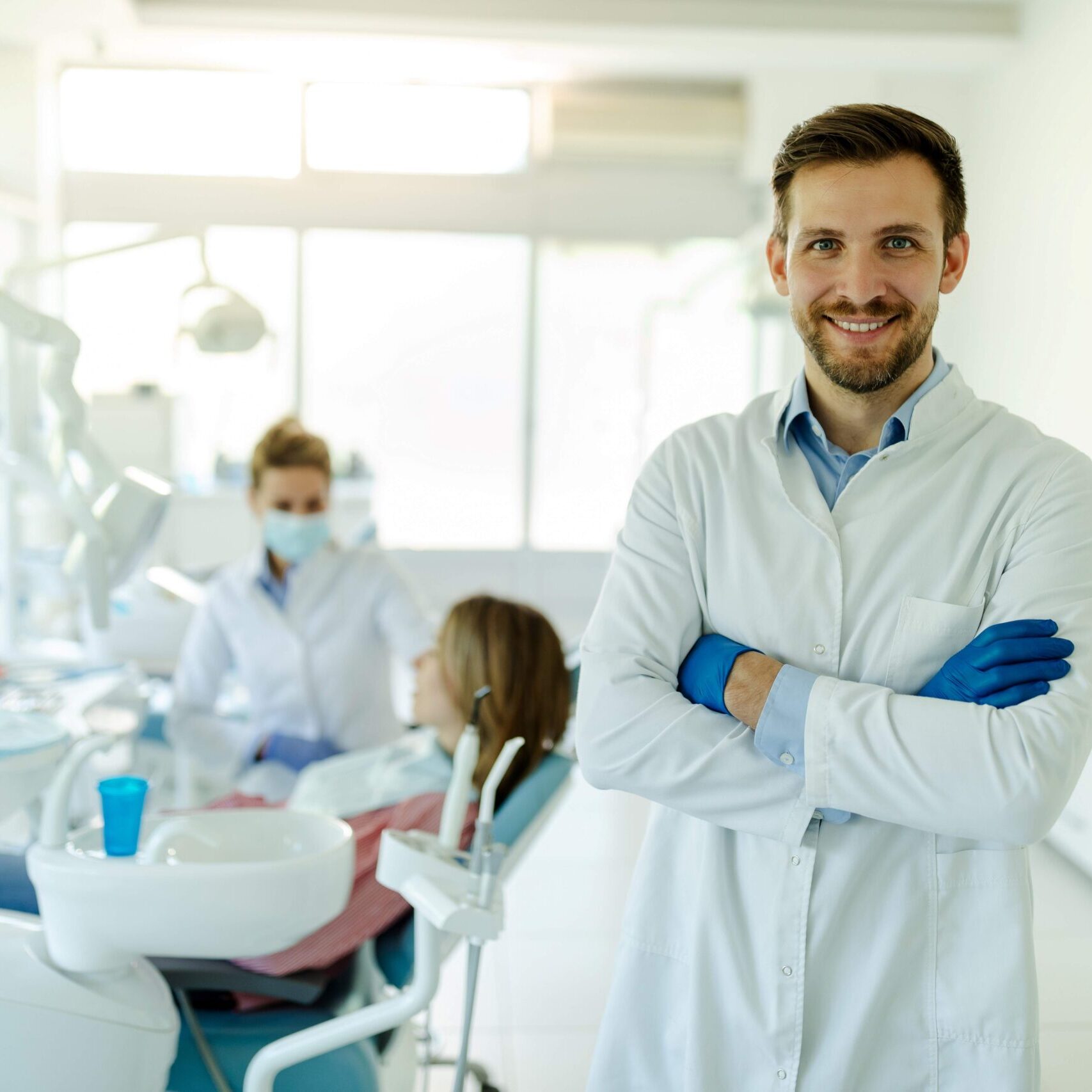 male-dentist-standing-with-his-hands-crossed-wear-2023-11-27-05-20-53-utc_resized